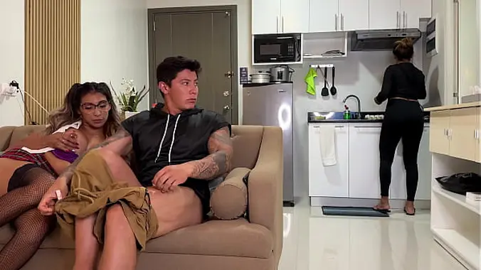 Naughty college girl fucks her mom's boyfriend on the couch and she doesn't notice